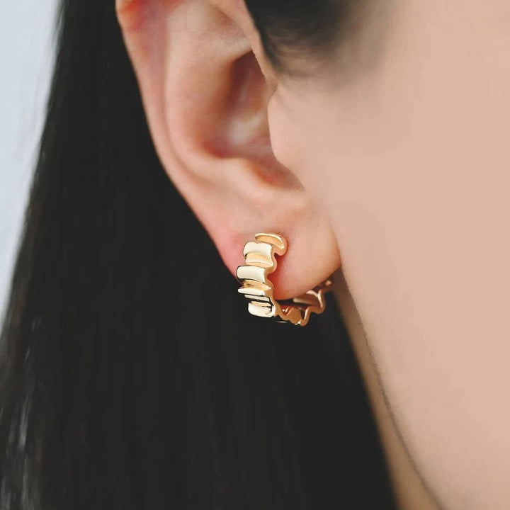 Gold Wave Huggie Hoops