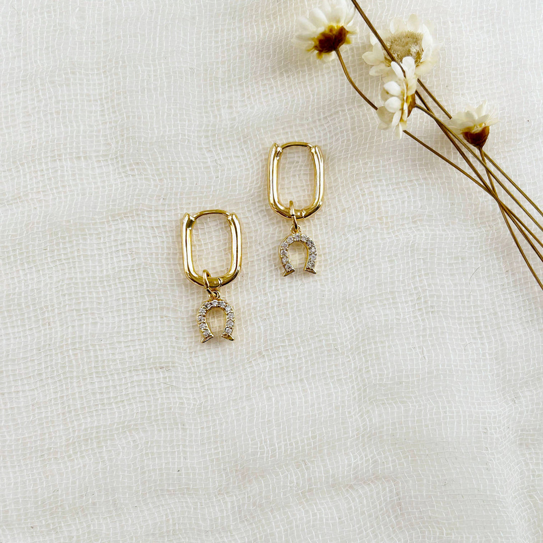 Horseshoe Charm Oval Huggie Hoops