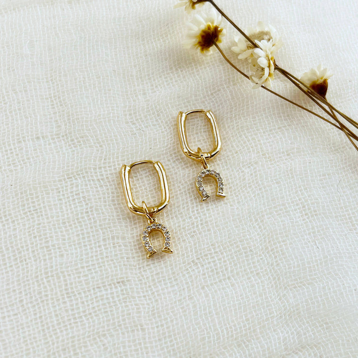 Horseshoe Charm Oval Huggie Hoops
